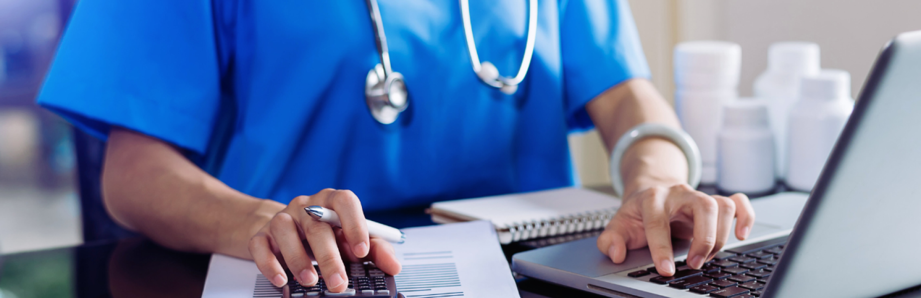 Nurse working on a laptop