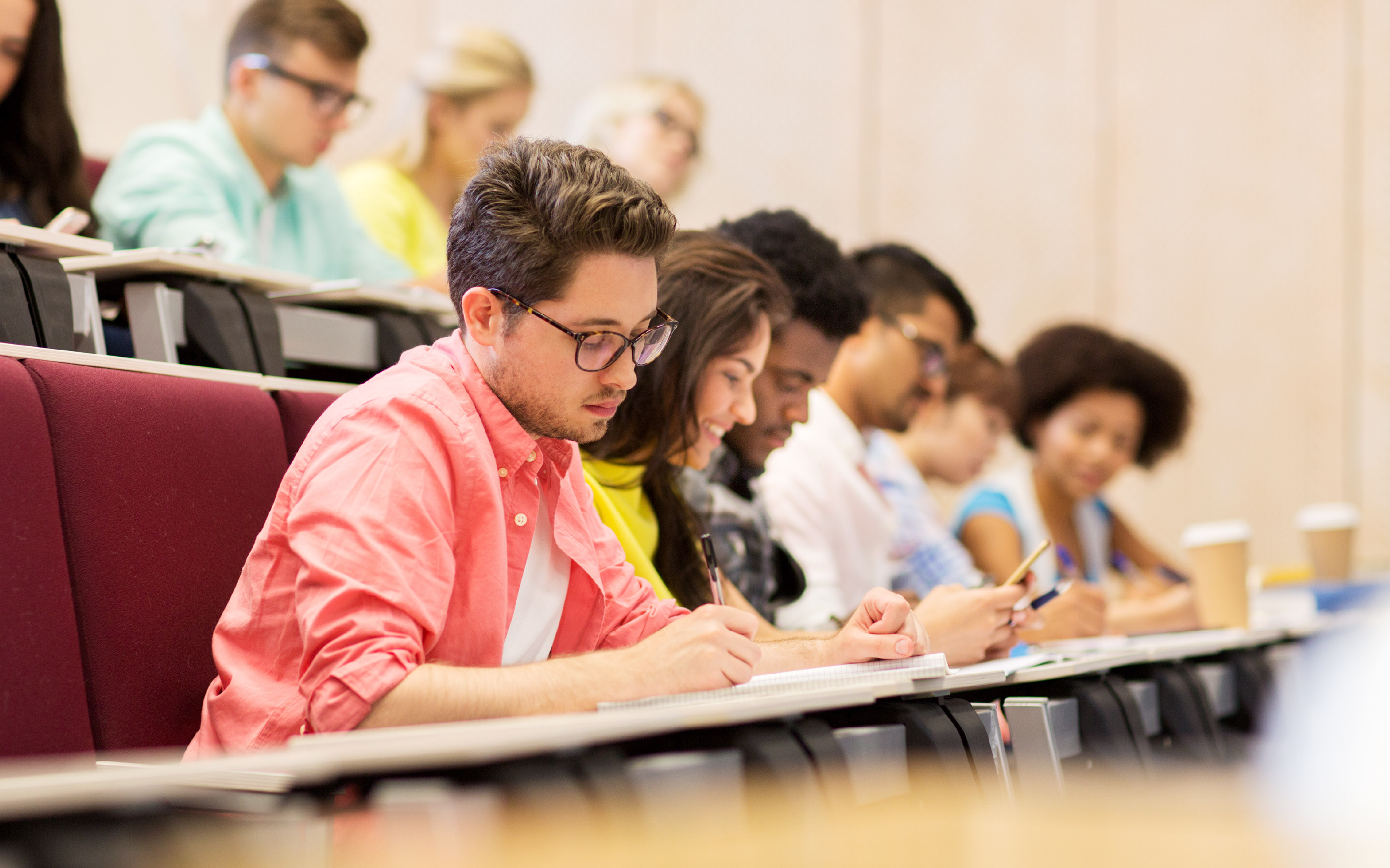 Students sat in a lecture theatre